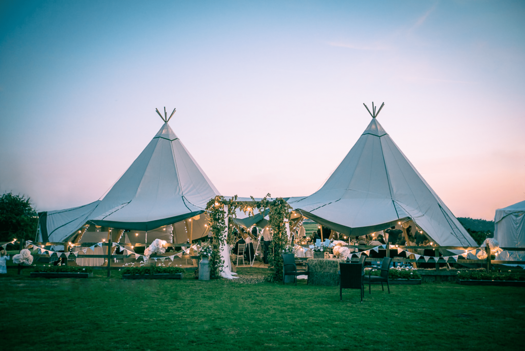 Copy of 2 white tipis, festoons, guests edit