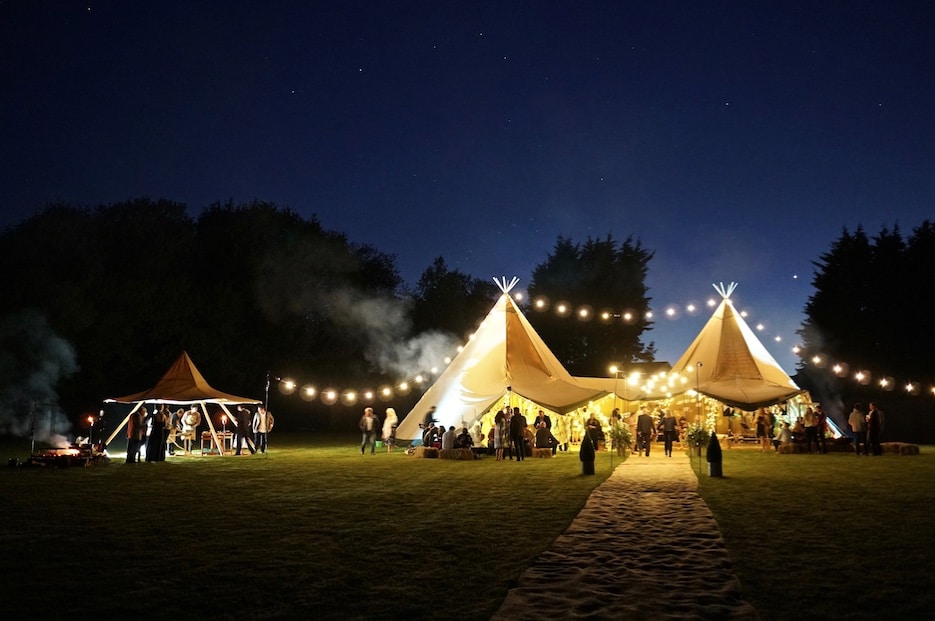 2 tipis, nimbus, apex festoon lighting, walkway copy