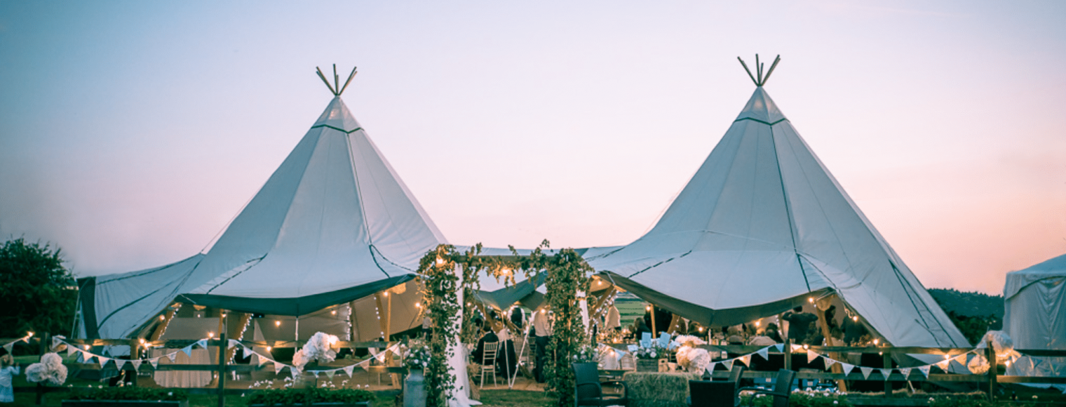 Copy of 2 white tipis, festoons, guests edit